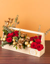 bouquet delivery online - Golden and red roses with chocolates in a wooden basket