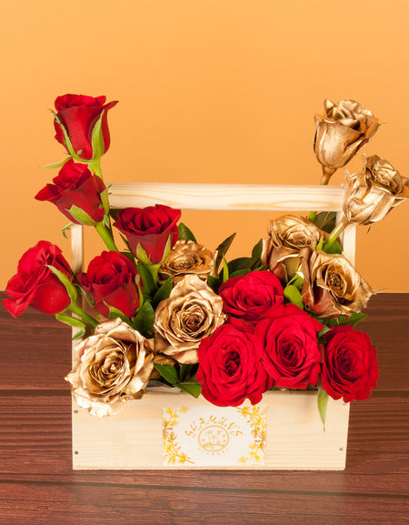 flower bouquet online - gold and red roses in a wooden basket