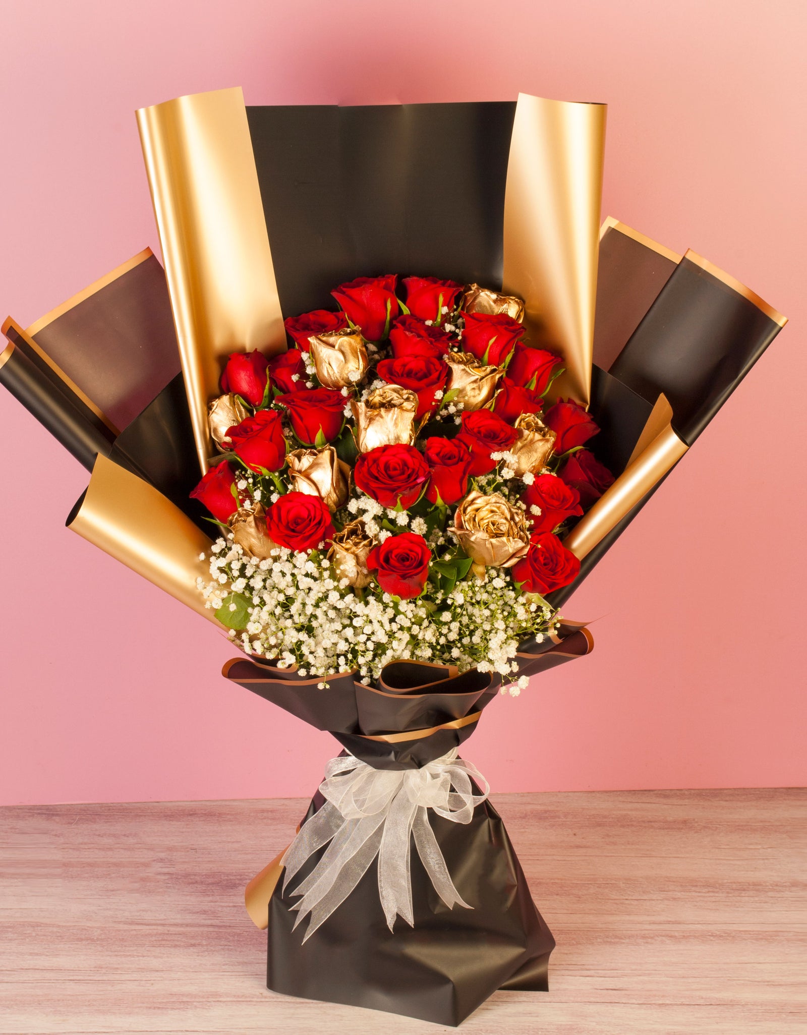 flower bouquet near me - red and gold roses hand tied