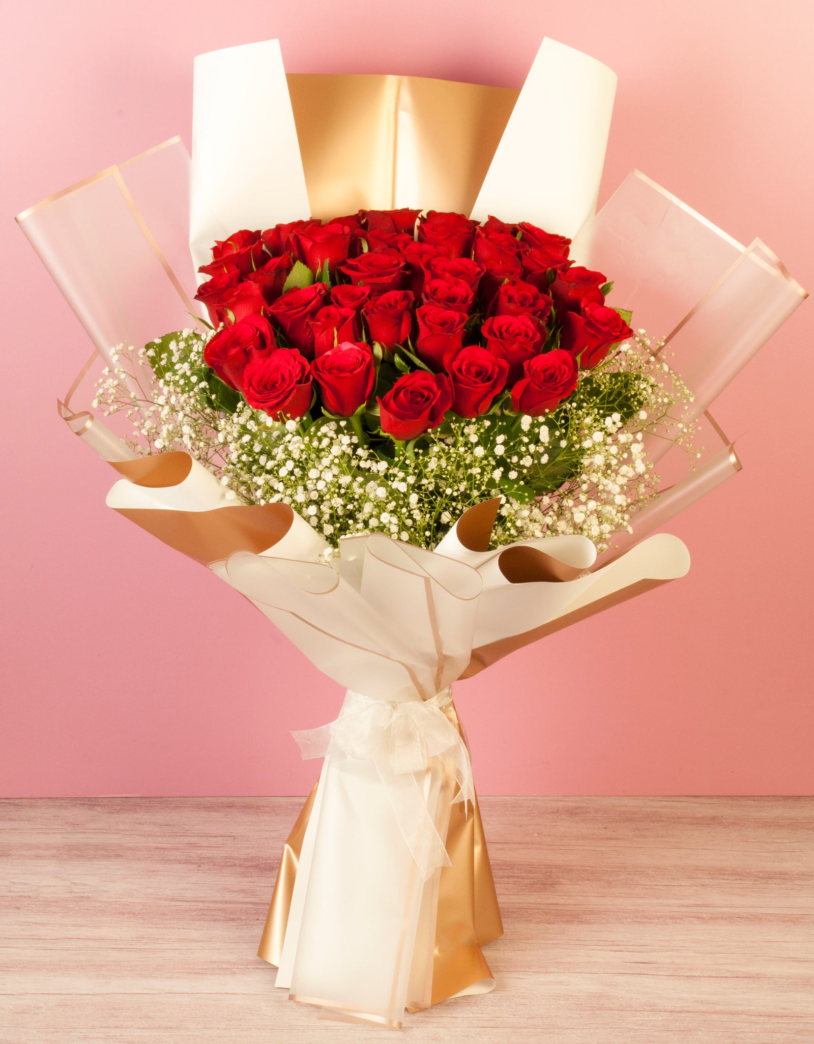 flower delivery to pune - 40 red roses hand tied