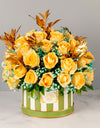 flower delivery in pune - box of yellow roses and gold leaves