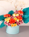 online flower delivery - box of yellow roses, orange carnations and purple chrysanthemums with artificial blue leaves