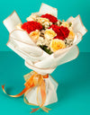 flower delivery to pune - yellow roses and red carnations hand tied bouquet