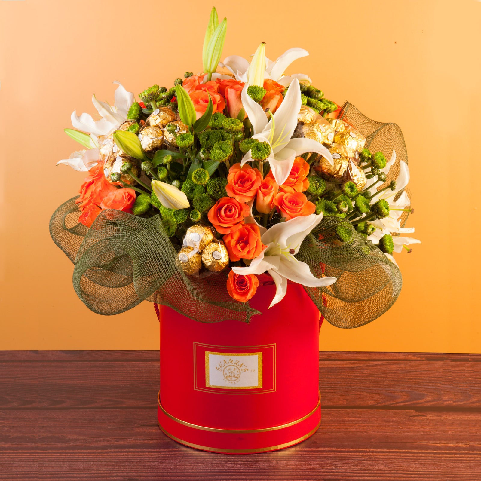 Peach Roses Lilies & Chocolate Delivery In A Hat Box