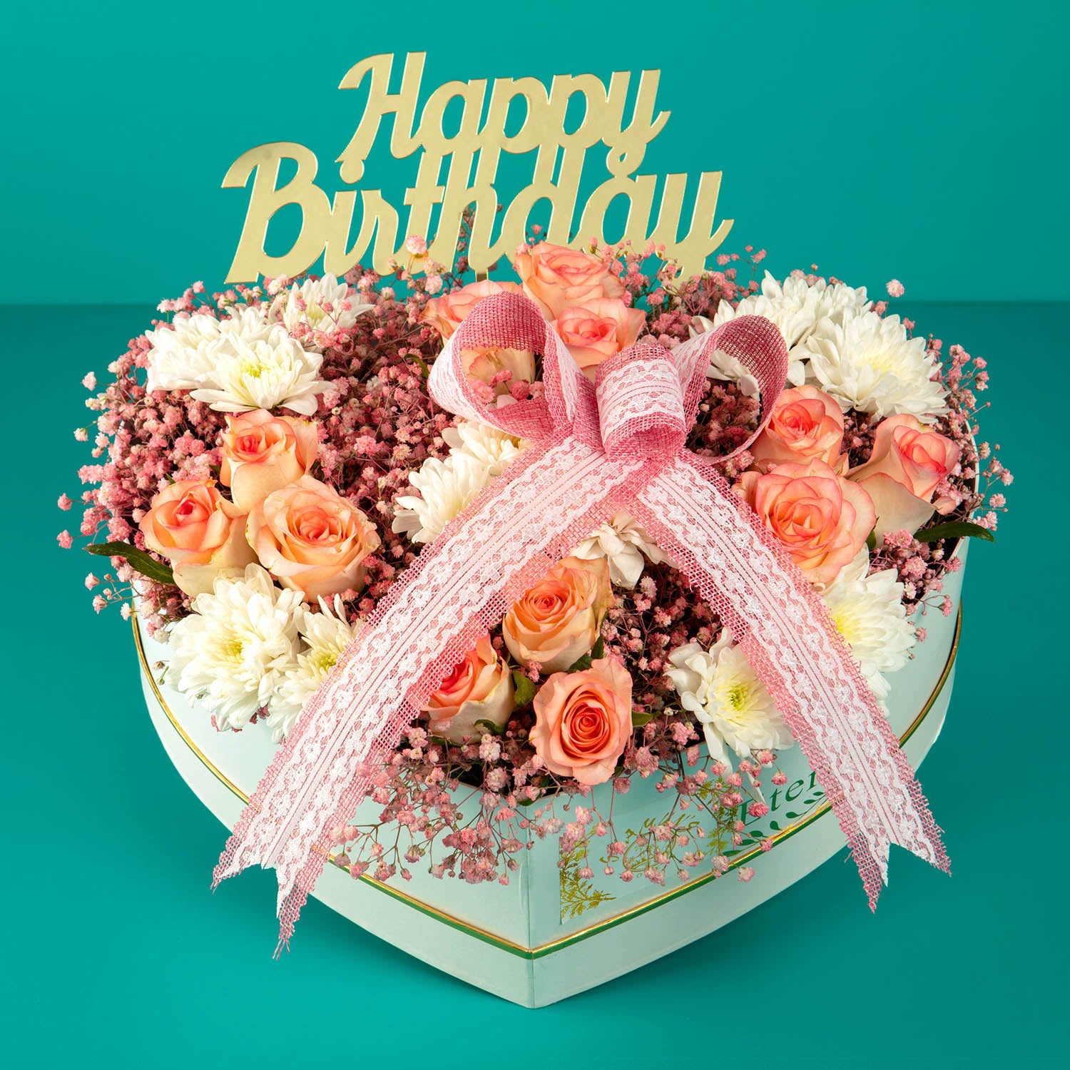 online flower delivery - flowers arranged in heart shaped box. bouquet for birthday