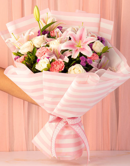 online flower delivery - lilies, roses, and chrysanthemums
